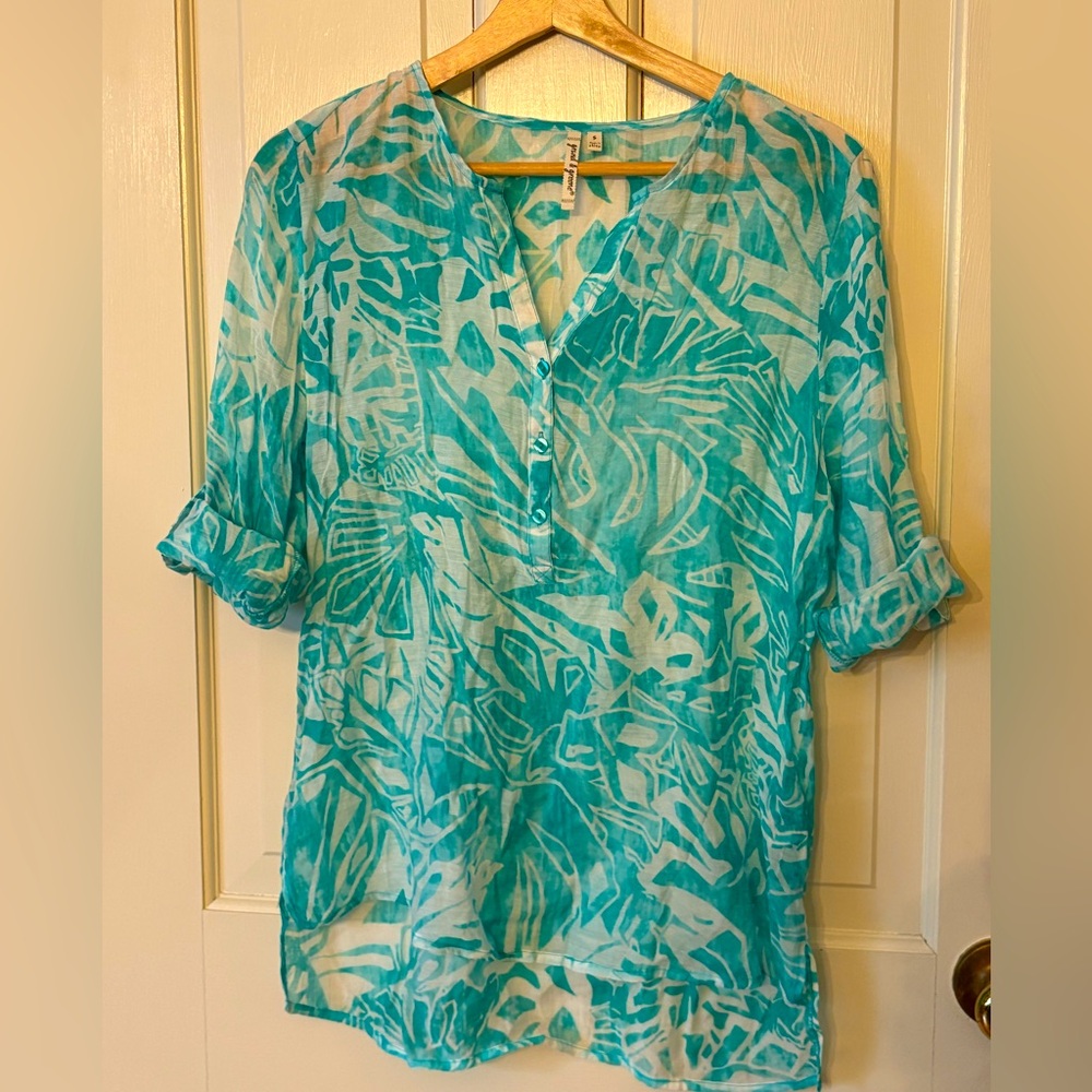 Light teal lightweight top.